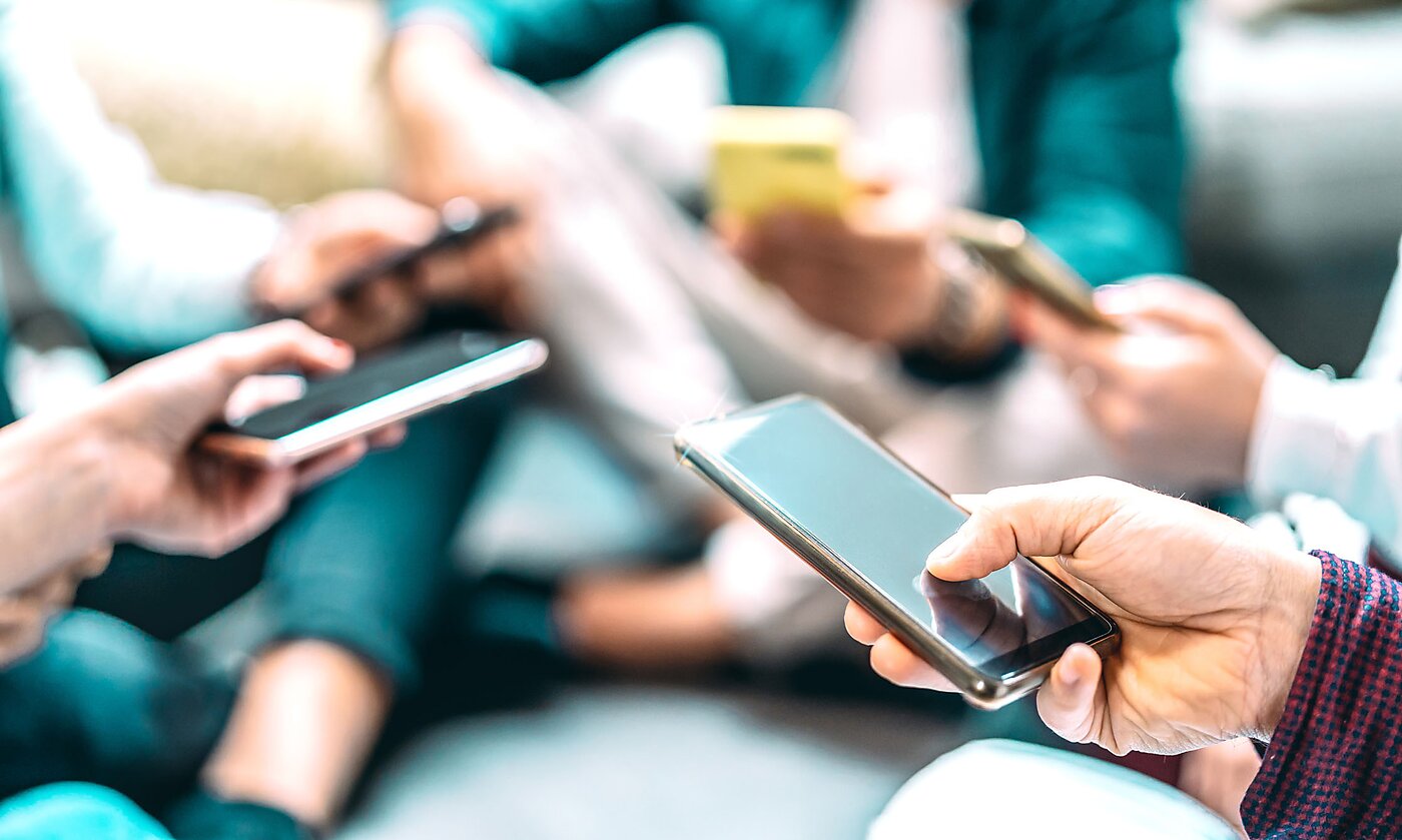 Stock photo of people on smartphones